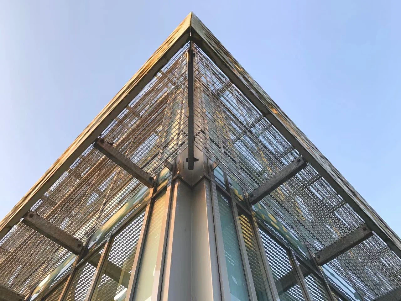 FRP grating rooftop walkway installed on commercial building exterior FRP grating rooftop walkway installed on commercial building exterior